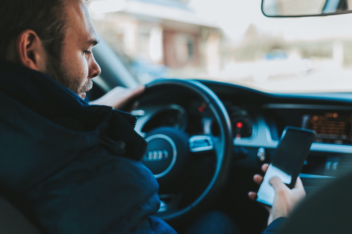 If you look at your phone for just 5 seconds while driving at 55mph, that means you have driven the length of a football field without looking at the road. *Photo by Alexandre Boucher on Unsplash*