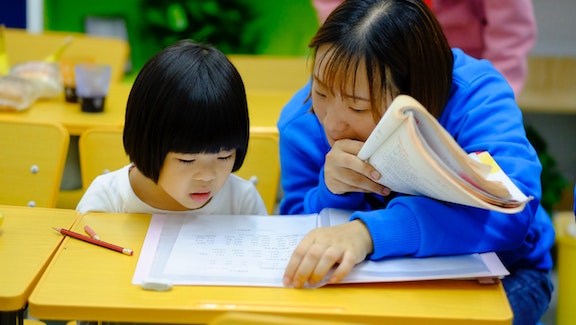 Single-subject research has shown that positive attention from a teacher for studying can increase studying and decrease disruptive behavior. *Photo by Jerry Wang on Unsplash.*